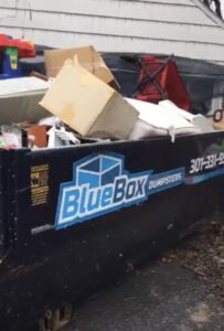 BlueBox Rental Dumpster at Hagerstown home during junk clean out